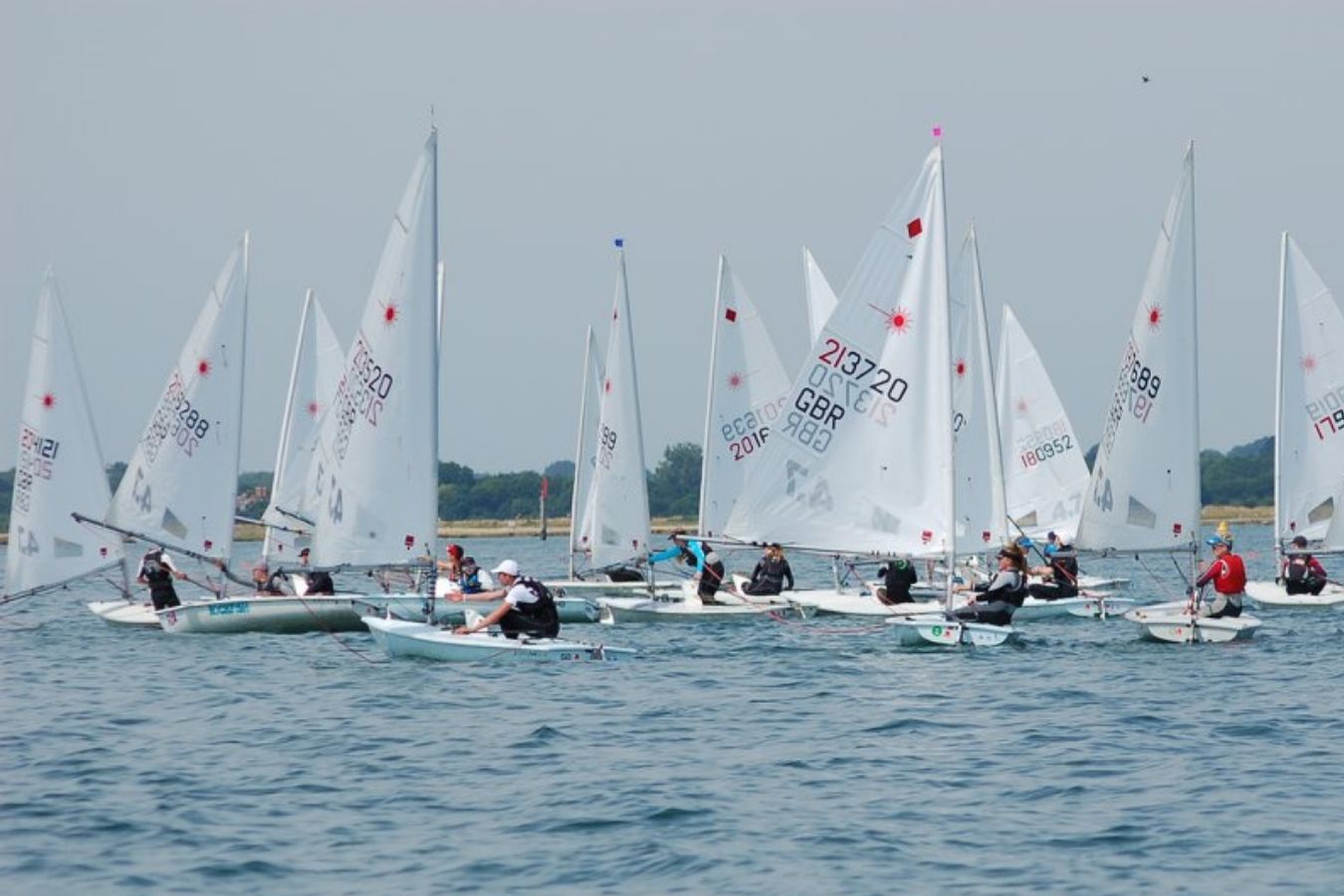Laser class dinghy sailing at the Royal Lymington Yacht Club Royal