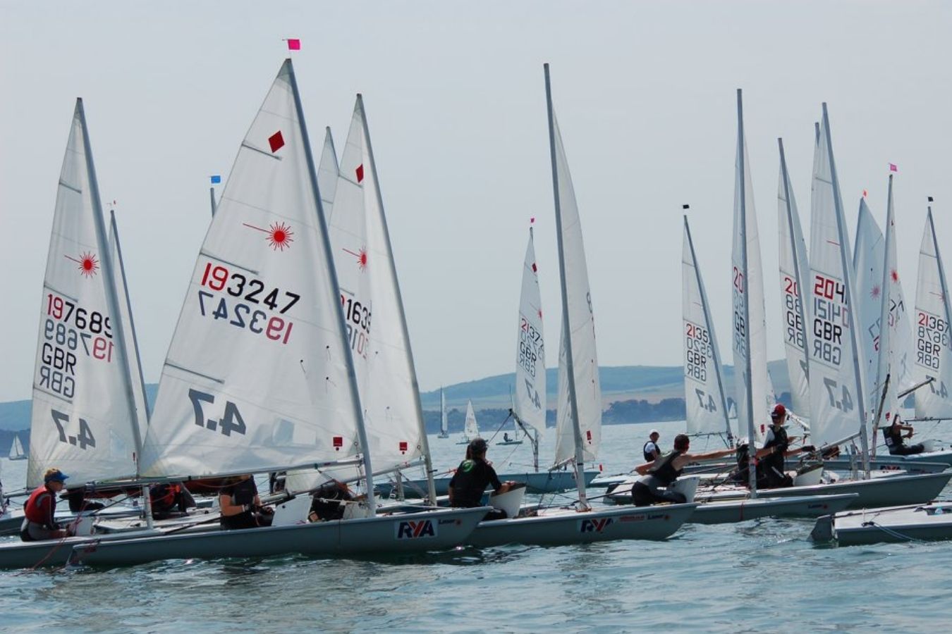 Laser class dinghy sailing at the Royal Lymington Yacht Club Royal