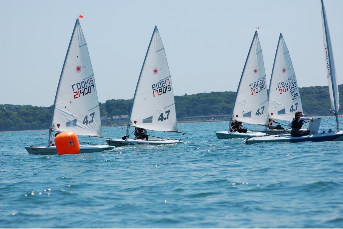 Laser class dinghy sailing at the Royal Lymington Yacht Club Royal