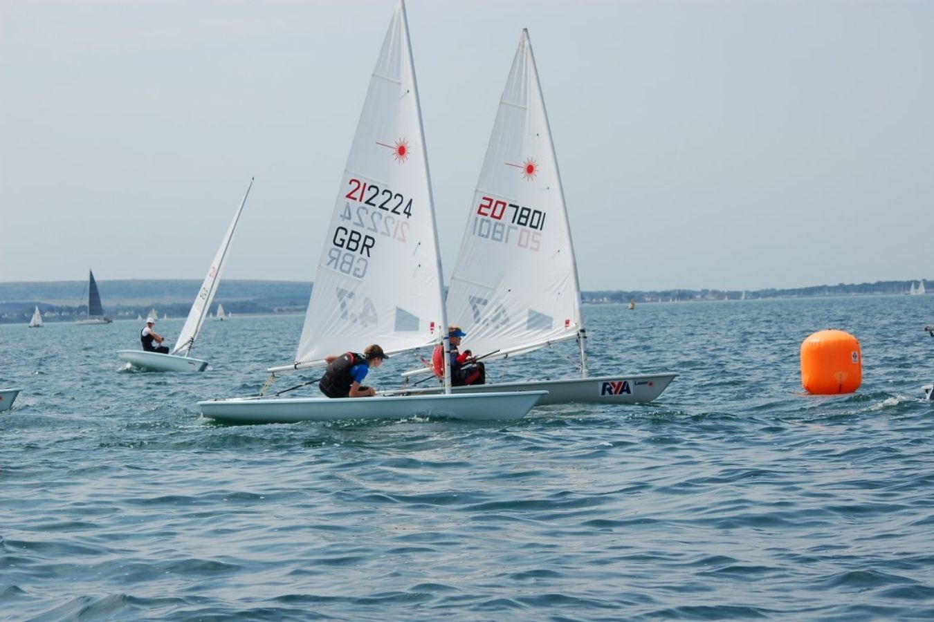 Laser class dinghy sailing at the Royal Lymington Yacht Club Royal